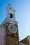 Vertical View of a Clock Tower in Pulsano, South of Italy