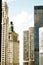 Vertical view of downtown Chicago buildings with clouds.