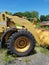 Vertical view of the front of abandoned construction machinery