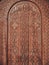 Vertical view of handmade ornate wooden gate texture