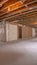 Vertical View of the interior wood framing beams of a new home under construction