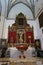 Vertical view. Side altar of Divino Salvador church in the Andalusian magical town of Cortegana, Huelva, Spain