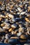 Vertical view of a stack of stones under the sunlight - good match for backgrounds