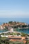 Vertical view of Sveti Stefan island with a promenade and beaches, Montenegro. St. Stephen islet, Budva riviera for