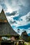Vertical view of traditional old batak people houses in lake toba in sumatra indonesia