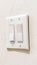 Vertical Wall mounted electrical rocker light switch with multiple flat broad levers