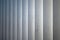 Vertical white wooden blinds