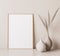 Vertical wooden frame mock up. Wooden frame poster, and simple vase with pampas on beige wall