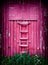 Vertical wooden ladder lean-to classic Norway cabin background