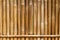 Vertical yellow bamboo fence