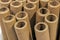 Verticaly Stacked Collection of Cardboard Packaging Tubes