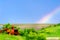 Very beautiful gentle spring photo. Rainbow on the field after  rain. Beautiful rainbow wallpaper. Photo for design, inspiration