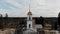 Very beautiful repair orthodox church with a golden dome and a cross