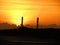 Very beautiful sun set in industrial area and tower.