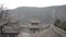 Very characteristic chinese rooftops in front of a huge river during a winter day