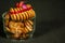 Very Close-Up Hearts Shaped Biscuit Tied With Red Ribbon In Water Glass