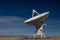 Very Large Array VLA radio antenna dish on pad in the New Mexico desert listening to the cosmos