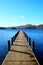 Very long beautiful wooden jetty, jutting out from the centre of