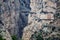 Very long shot vintage Caminito del rey, tourists, bridge