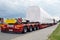 Very long vehicle. Oversize load or exceptional convoy. A truck with a special semi-trailer for transporting oversized loads