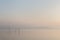 A very minimalistic view of a Trasimeno lake at dawn, with soft