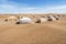 Very nice camp with a few tents surrounded by sand dunes of Sahara desert, Morocco