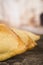 Very nice empanadas on wooden surface, perfect golden color and rustic elegant presentation