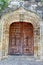 Very old wooden doors in a Spanish castle, Spain