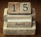 Very old wooden vintage calendar showing the date 15th April o