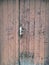 Very old wooden and weathered brown front door