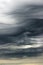 Very rare dark grey stratus clouds. Stratus undulatus in Latin language. Upper atmosphere, troposphere. Aerial view, skyscape.