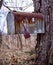 A Very Rusty Large Old Metal Mailbox On A Tree