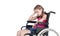 Very sad handicapped girl in a wheelchair