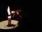 Very Simple Conceptual Photo, Man`s Right Hand Firing White Flaming Candle at black background for your element design