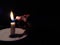 Very Simple Conceptual Photo, Man`s Right Hand Firing White Flaming Candle at black background for your element design