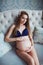 Very skinny vegetarian healthy pregnant women beautiful model in underwear at bright studio