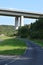 very small country road under an Autobahn bridge in the Eifel