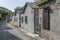 very small fishermen houses on narrow street at Punta Sdobba village, Grado, Friuli, Italy