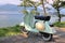 Vespa italian scooter parked on the la ke meggiore in italy, picture taken on   1st june 2020