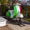 A Vespa scooter motorbike painted in the striped colors of Italian Flag