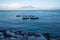 Vesuvius view from Naples bay, old boats on the sea.