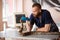 Vet holds snake. Treatment of reptiles and snakes in veterinary clinic