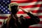 Veterans Day, Memorial Day, Independence Day. A female soldier salutes against the background of the American flag. Rear view. The