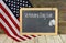 Veterans Day Sale sign on chalkboard