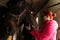 Veterinarian administering injection to horse