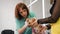 Veterinarian Cleaning Ears of Yorkshire Terrier