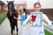 Veterinarian conducts medical examination of sports horse closeup