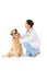 Veterinarian crouching with a dog