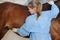 Veterinarian doctor with horse