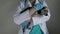 Veterinarian doctor strokes a dog in a veterinary clinic, holds a pet in his arms, calms down before examination